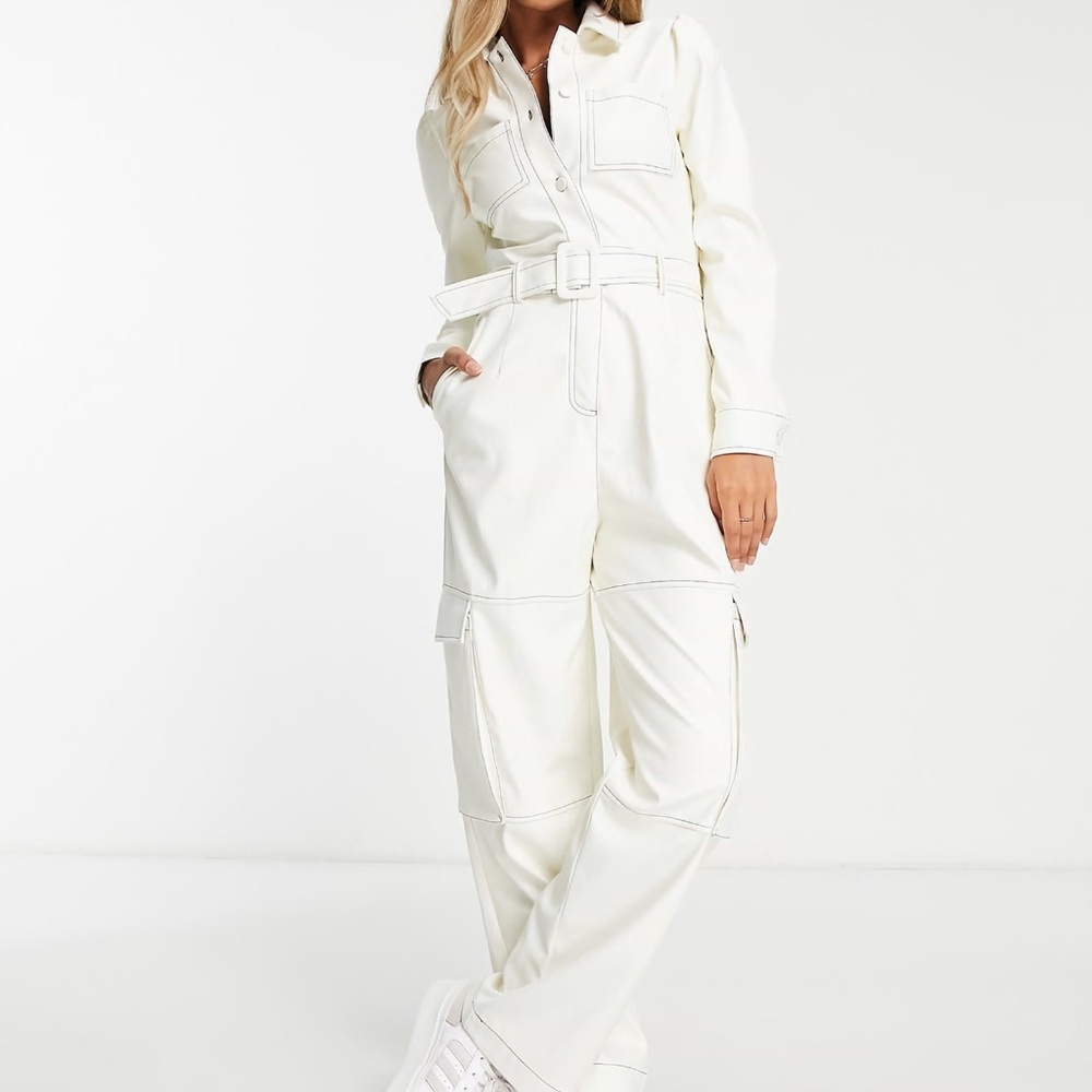 Off white pleather winter jumpsuit with black contrast stitching size 6.